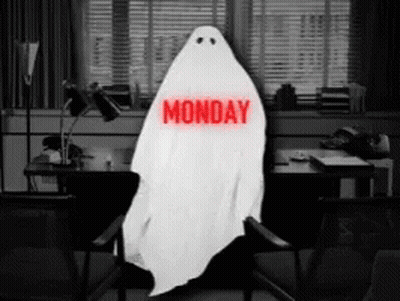 A Ghost Sitting In A Chair With Monday Written On It GIF