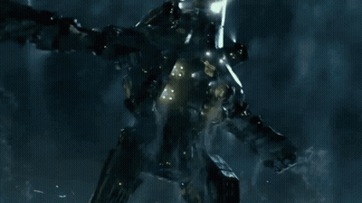 A Giant Monster With A Glowing Light Coming Out Of It 'S Mouth GIF