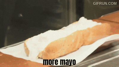 A Gif From Gifrun.com Shows A Hot Dog With Mayo GIF