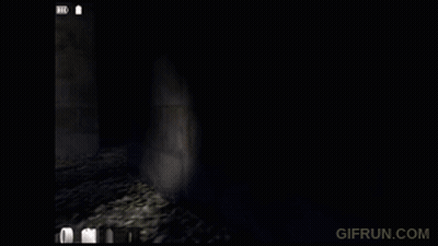 A Gif From Gifrun.com Shows A Smiling Face In A Dark Room GIF