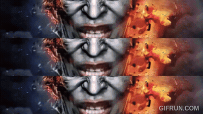 A Gif From Gifrun.com Shows A Woman 'S Face And Fire GIF