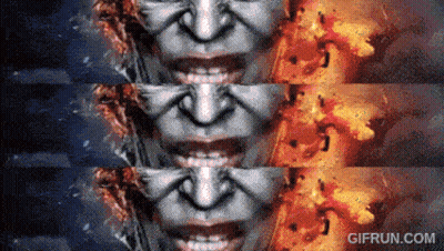 A Gif From Gifrun.com Shows A Woman 'S Face With Fire Coming Out Of Her Mouth GIF