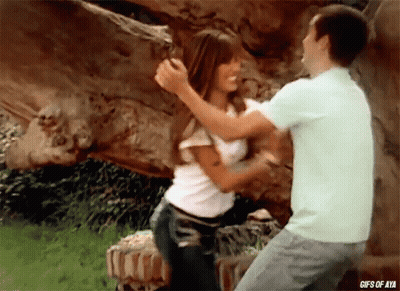 A Gif Of A Man And A Woman Hugging With The Words Gifs Of Aya Below Them GIF