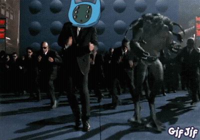 A Gif Of A Man In A Suit Dancing With A Monster And The Words Gif Jif At The Bottom GIF