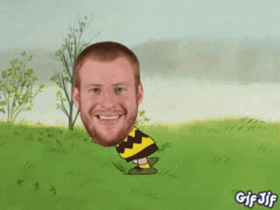 A Gif Of A Man With A Beard And A Charlie Brown Costume GIF
