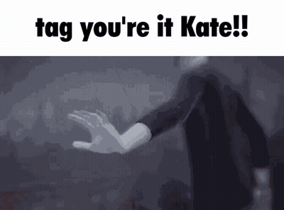 A Gif Of A Person Reaching Out With The Words Tag You 'Re It Kate Written Above Them GIF