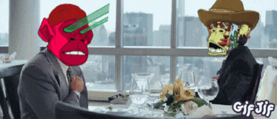 A Gif Of Two Monkeys Sitting At A Table With The Words Gif Jif On The Bottom GIF