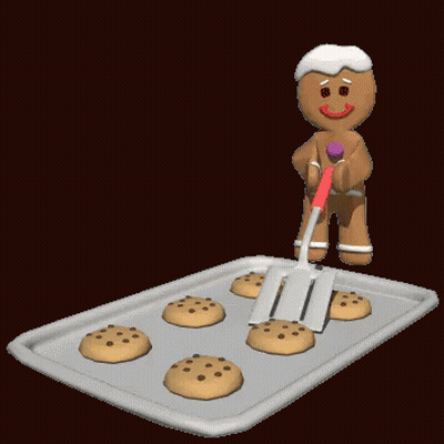 A Gingerbread Man Is Holding A Spatula Over A Baking Sheet Of Cookies GIF