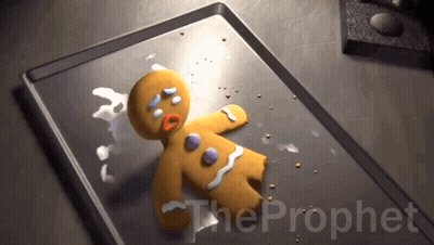 A Gingerbread Man Is Laying On A Baking Sheet With The Prophet Written On The Bottom GIF