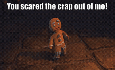 A Gingerbread Man With The Words You Scared The Crap Out Of Me Below Him GIF