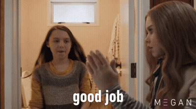 A Girl Giving Another Girl A High Five With The Words Good Job Behind Her GIF