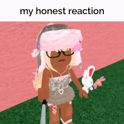 A Girl Holding A Bunny And A Flower With The Words " My Honest Reaction " Written Above Her GIF