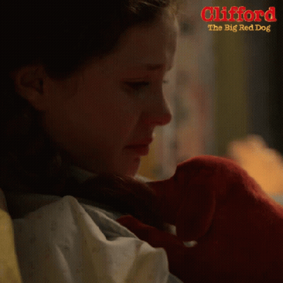 A Girl Holding A Stuffed Animal With The Words Clifford The Big Red Dog GIF