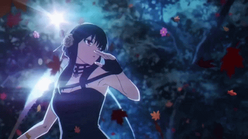 A Girl In A Black Dress Is Standing In A Dark Forest . GIF