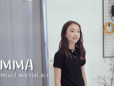 A Girl In A Black Shirt With Mma Mixed Martial Arts Written Above Her GIF