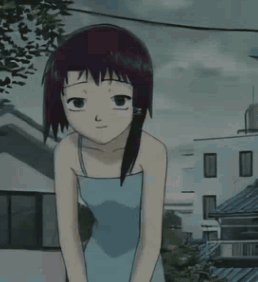 A Girl In A Blue Dress Is Smiling And Looking At The Camera GIF