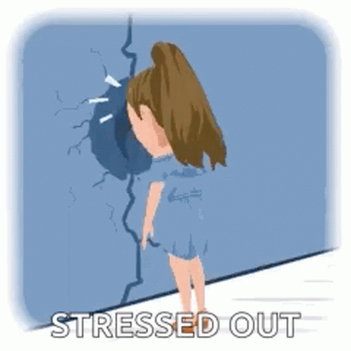 A Girl In A Blue Dress Is Standing In Front Of A Wall With A Hole In It . GIF