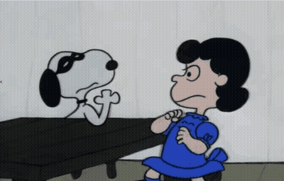 A Girl In A Blue Dress Is Standing Next To A Dog With A Mask On His Face GIF