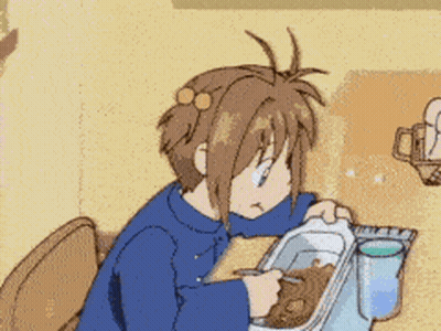A Girl In A Blue Shirt Is Eating A Casserole Dish GIF