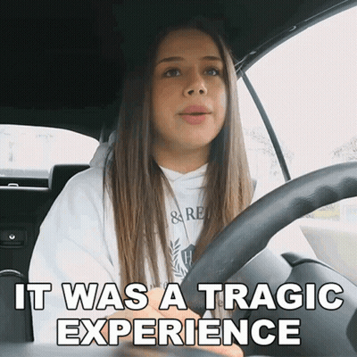 A Girl In A Car With The Words " It Was A Tragic Experience " Behind Her GIF
