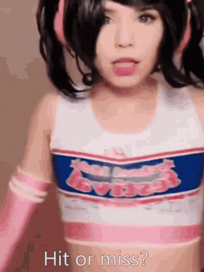 A Girl In A Cheerleader Outfit Is Asking If She Is Hit Or Miss GIF