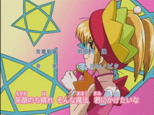 A Girl In A Colorful Costume Is Standing In Front Of A Star GIF