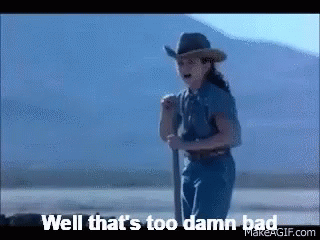 A Girl In A Cowboy Hat Is Holding A Shovel And Saying Well That 'S Too Damn Bad GIF
