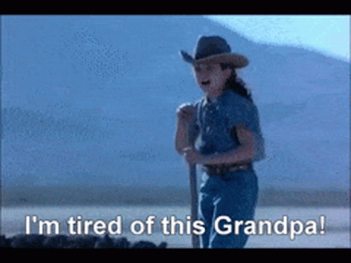 A Girl In A Cowboy Hat Is Tired Of Her Grandpa GIF