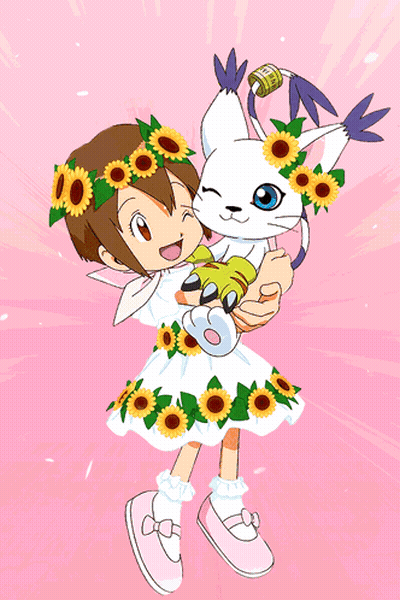 A Girl In A Dress With Sunflowers On It Holds A Cat GIF