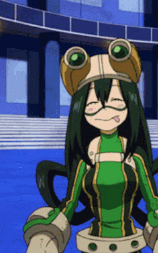 A Girl In A Frog Costume Is Sitting In Front Of A Building . GIF