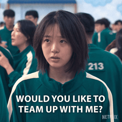 A Girl In A Green Jacket With The Number 213 On Her Back Says Would You Like To Team Up With Me GIF