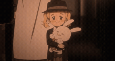 A Girl In A Hat Holds A Stuffed Rabbit GIF