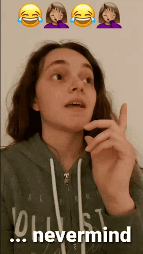 A Girl In A Hollister Sweatshirt Says " Nevermind " In Front Of Emojis GIF