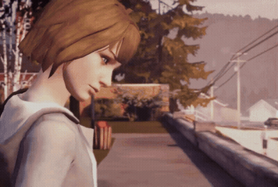 A Girl In A Hoodie Stands On A Sidewalk GIF