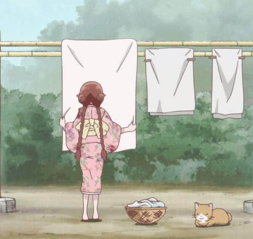 A Girl In A Kimono Is Hanging Clothes On A Clothesline GIF