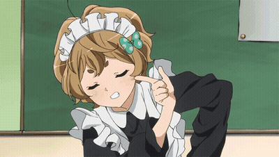 A Girl In A Maid Outfit Is Pointing To Her Face GIF