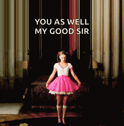 A Girl In A Pink Dress Stands In Front Of A Bed With The Words " You As Well My Good Sir " Above Her GIF