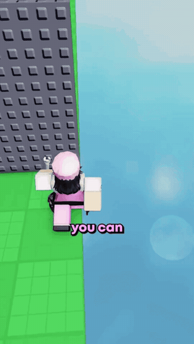 A Girl In A Pink Hat Is Standing On A Green Block With The Words " You Can " Above Her GIF