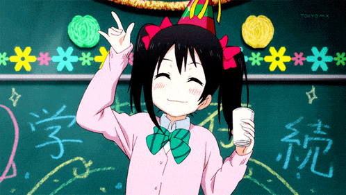 A Girl In A Pink Shirt Is Holding A Cup Of Milk In Front Of A Blackboard With Tokyo Mx Written On It GIF