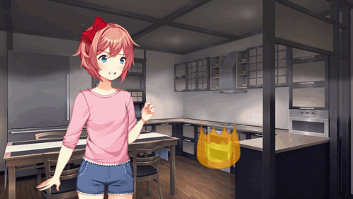 A Girl In A Pink Shirt Stands In A Kitchen GIF