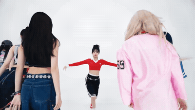 A Girl In A Pink Shirt With The Number 59 On The Back GIF