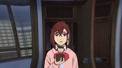 A Girl In A Pink Sweater Is Holding A Wallet In Her Hand GIF