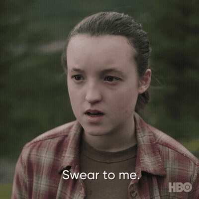 A Girl In A Plaid Shirt Is Making A Swear To Me Face GIF