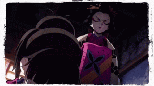 A Girl In A Ponytail Stands Next To A Woman In A Pink Dress With A Star On It GIF