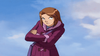 A Girl In A Purple Coat Has Her Arms Crossed And Looks Angry GIF