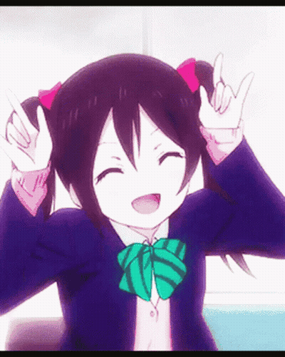 A Girl In A Purple Jacket And Green Bow Tie Is Making A Peace Sign With Her Hands . GIF