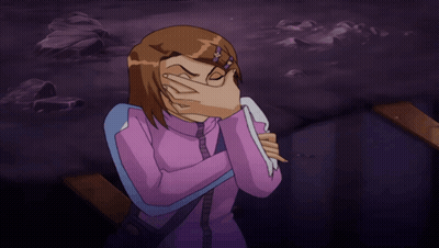 A Girl In A Purple Shirt Is Covering Her Face With A Towel GIF