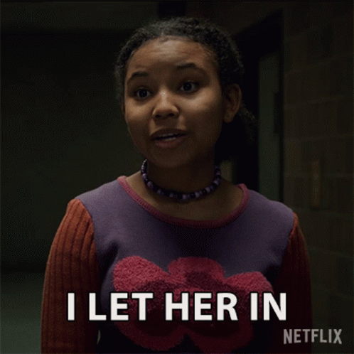 A Girl In A Purple Sweater Is Saying I Let Her In GIF