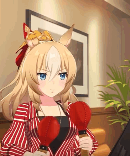A Girl In A Red And White Striped Shirt Is Holding A Pair Of Boxing Gloves GIF