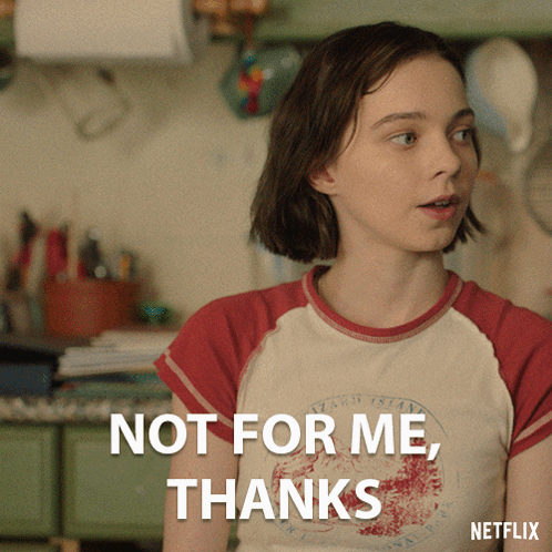 A Girl In A Red And White T-Shirt Says Not For Me Thanks GIF